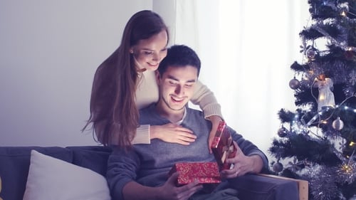 Pretty Caucasian Woman Getting Chrismas Gift