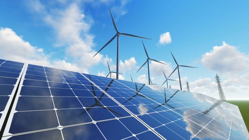 Clean Energy: Solar Panels and Wind Turbines under Blue Sky