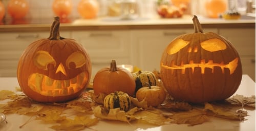 Spooky Jack-o-lanterns and Small Pumpkins