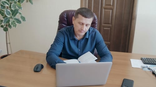 Businessman in an Office Is Stressed Out