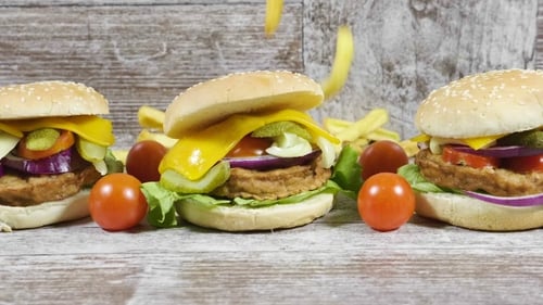 Tasty Vegan Burgers with Toppings and French Fries