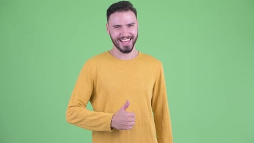 Cheerful Man Giving Thumbs Up on Green Screen