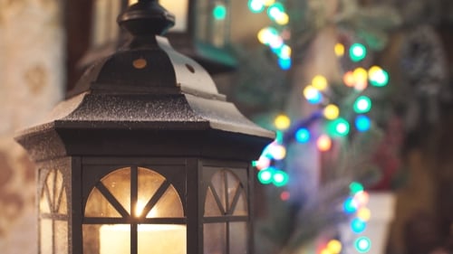 Cozy Candlelight in Lantern with Christmas Lights