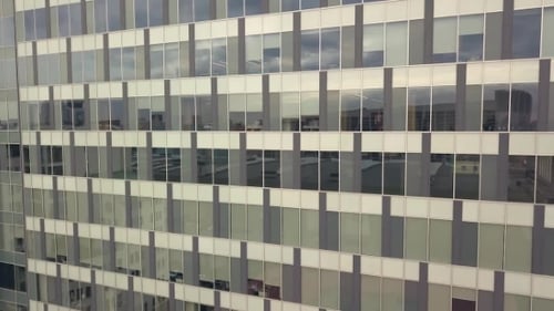 Glass Building Front View. Business Office Buildings and Car Parking in City