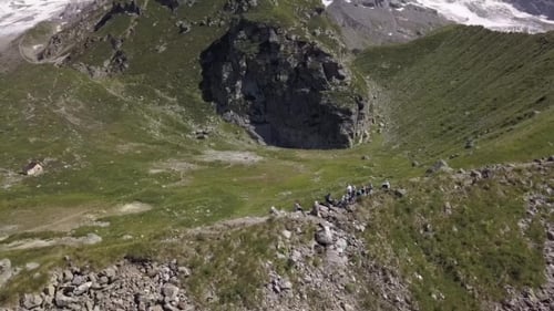 Top View Hiking Group Standing on Mountain Edge. Mountains Landscape