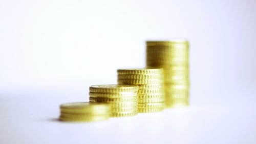 Rising Stacks of Coins Show Financial Growth