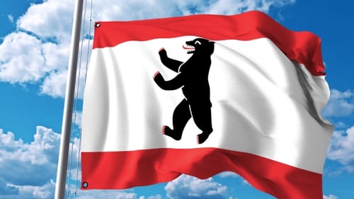 Berlin City Flag Waving Against a Clear Blue Sky