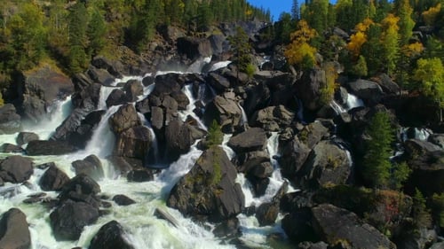 Aerial View of Waterfall, Flying Over Autumn Forest, Waterfall with Big Stones