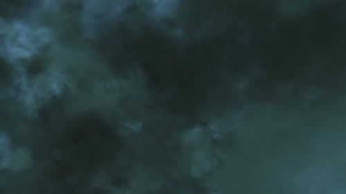Flying Through Stormy Clouds Lit with Lightning Bolt Flash