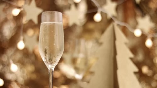 Festive Champagne Flute with Christmas Decorations