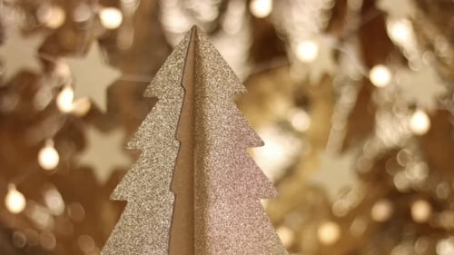 Gold Christmas Tree With Starry Bokeh Background