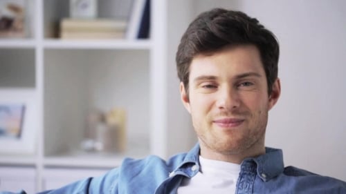 Happy Smiling Young Man at Home 55