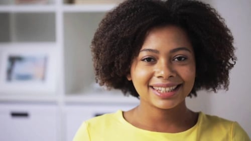 Woman Smiling Brightly in Close-Up Portrait