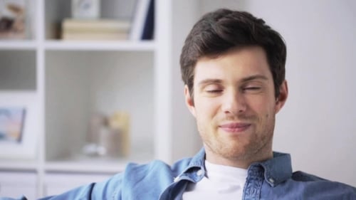 Happy Smiling Young Man at Home 56