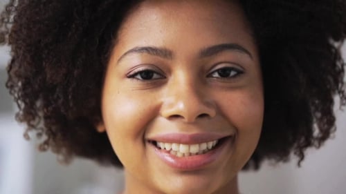 Happy Woman Smiling in Close Up Portrait