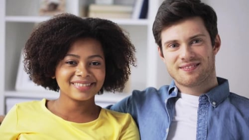 Smiling Couple in Indoor Home Setting