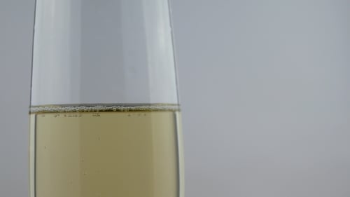 Champagne Glass Filled with Bubbly Liquid