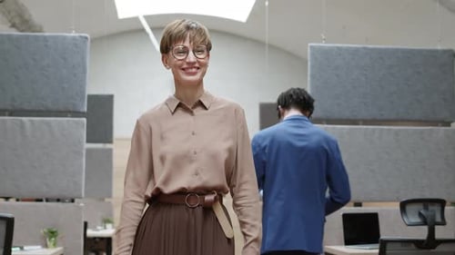 Businesspeople Greeting Each Other in Office