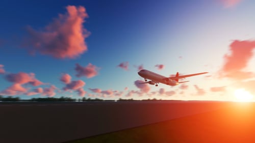 The Plane Landing to Buffalo in USA at Sunset