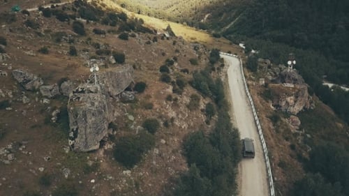 Drone View Truck Car Driving Along Winding Road Mountain at Sumer Day