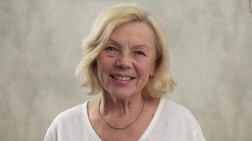 Smiling Woman Looking at Camera Close Up