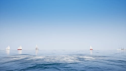 Boats on Clear Blue Ocean