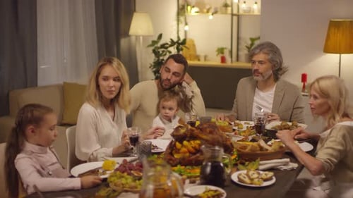 Family Gathering at Home Enjoying Festive Meal