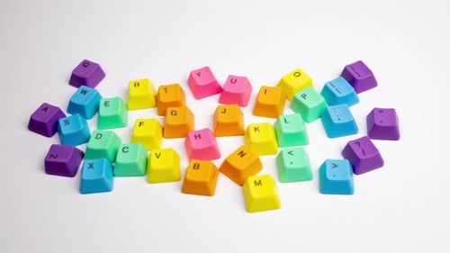 Arrangement of Brightly Colored Keyboard Keys on White