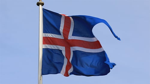 Flag Waving Against Blue Sky