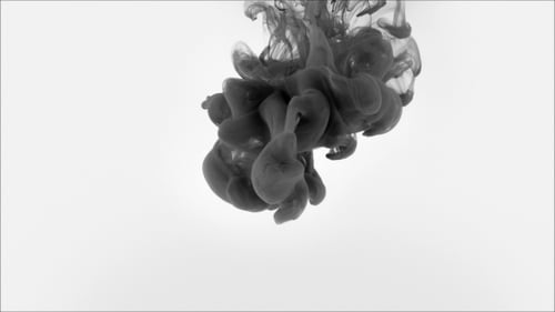 Black Ink Billowing in Clear Liquid