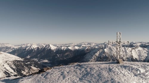 Flying Near the Cross on the Mountain Top
