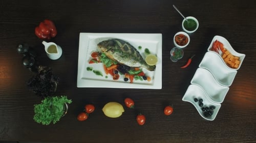 Chef Hands Served Whole Fish. Restaurant Preparation