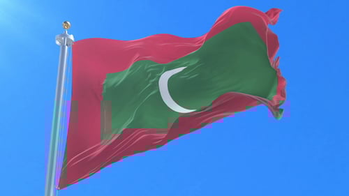 Realistic Maldives Flag Waving against Blue Sky Loop
