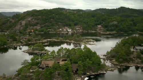 Picturesque Lake Surrounded by Lush Greenery From Above