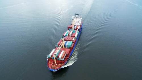 Cargo Ship Sailing in Sea