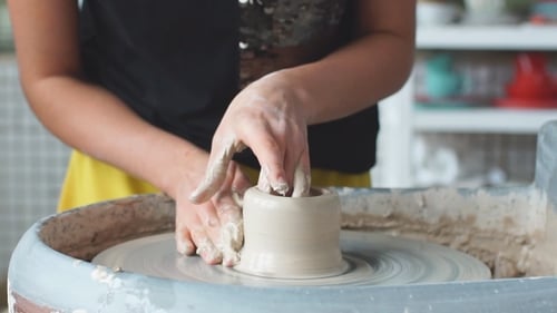 Pottery Class Workshop. Clay Shaping on Potter's Wheel. Potter Teaches His Craft To the Children.