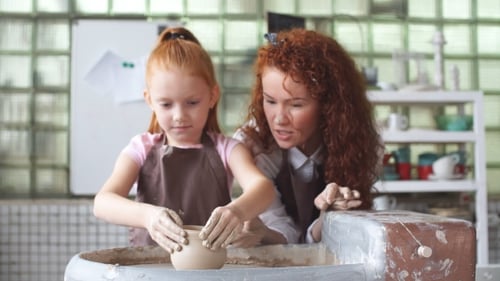 Pottery Class Workshop. Clay Shaping on Potter's Wheel and Firing.