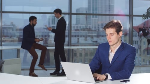 Young Adults Working in a Modern Office