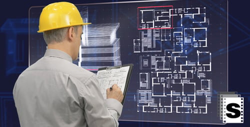 Architect Using Futuristic Screen