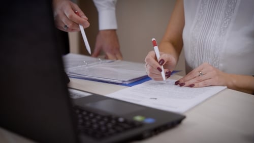 Businessman Makes a Deal with Client in the Office