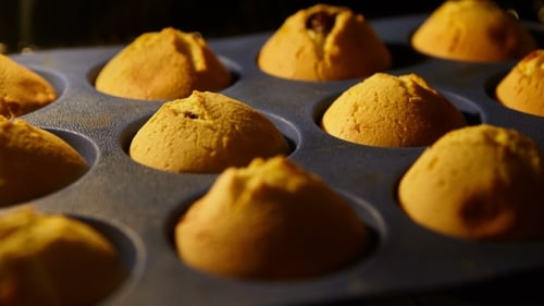Muffins Baking in Oven Close Up