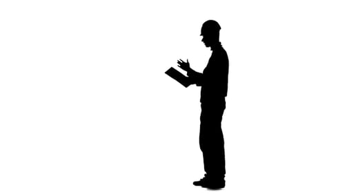 Foreman Looks at the Paper Plan of the Building and Screams at His Workers. Silhouette. White