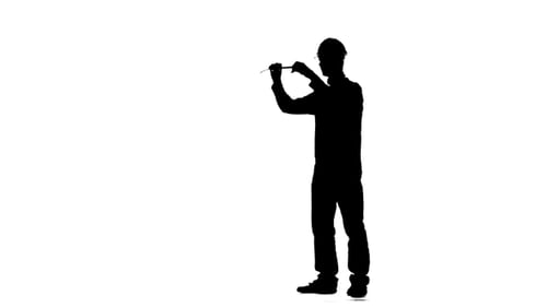 Builder Measures Roulette Measurements for the Drawing. Silhouette. White Background