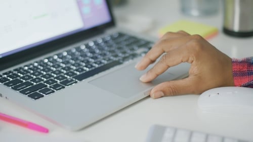 Anonymous Woman Using Laptop