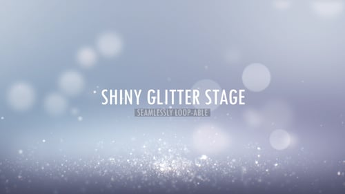 Elegant Glitter Particles with Soft Bokeh Lights Background Loop
