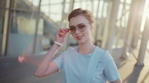 Glamorous Woman Posing Outdoors in the City