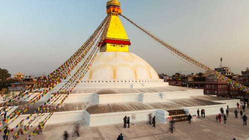 Aerial View of a White Buddhist Stupa Landmark