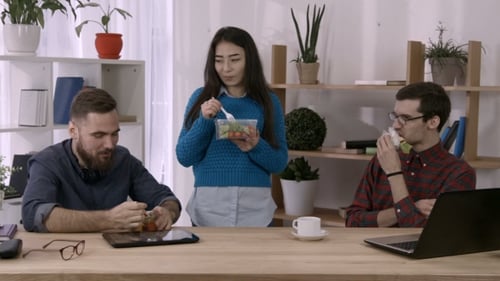 Casual Business Team Having Lunch Break at Office