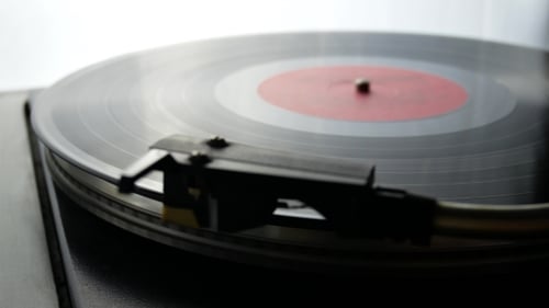 Vinyl Record Playing on Turntable Close Up