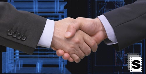 Business Handshake Over Architectural Blueprints Design